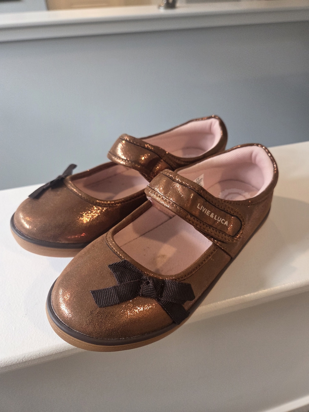 Livie & Luca Metallic Bronze Mary Jane Shoes with Black Bow